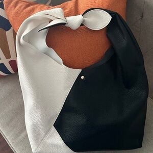 Fashionable flair …  Oversized shoulder tote…
